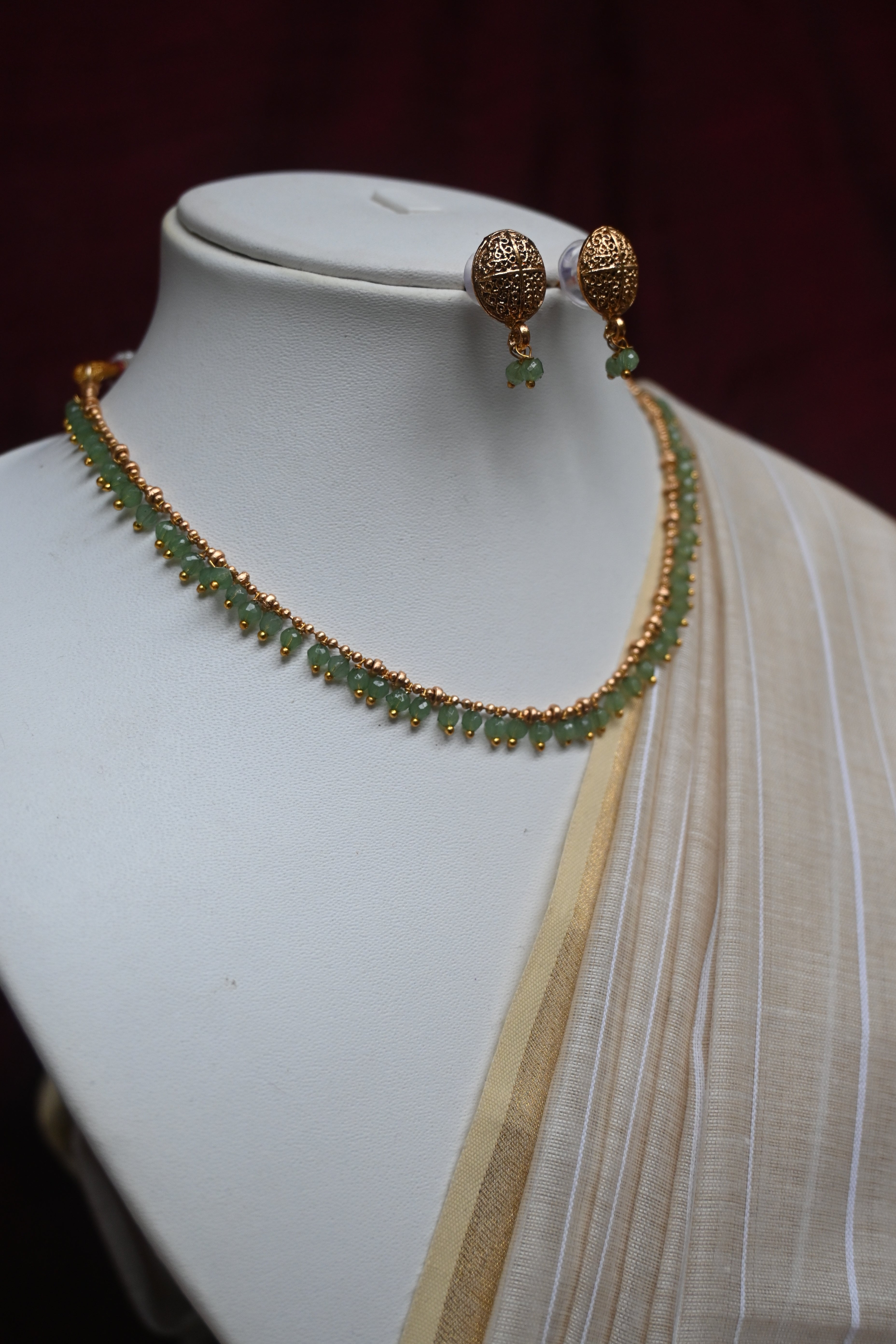 Lakshya - Gold bead with Green Crystal Drop Necklace Set