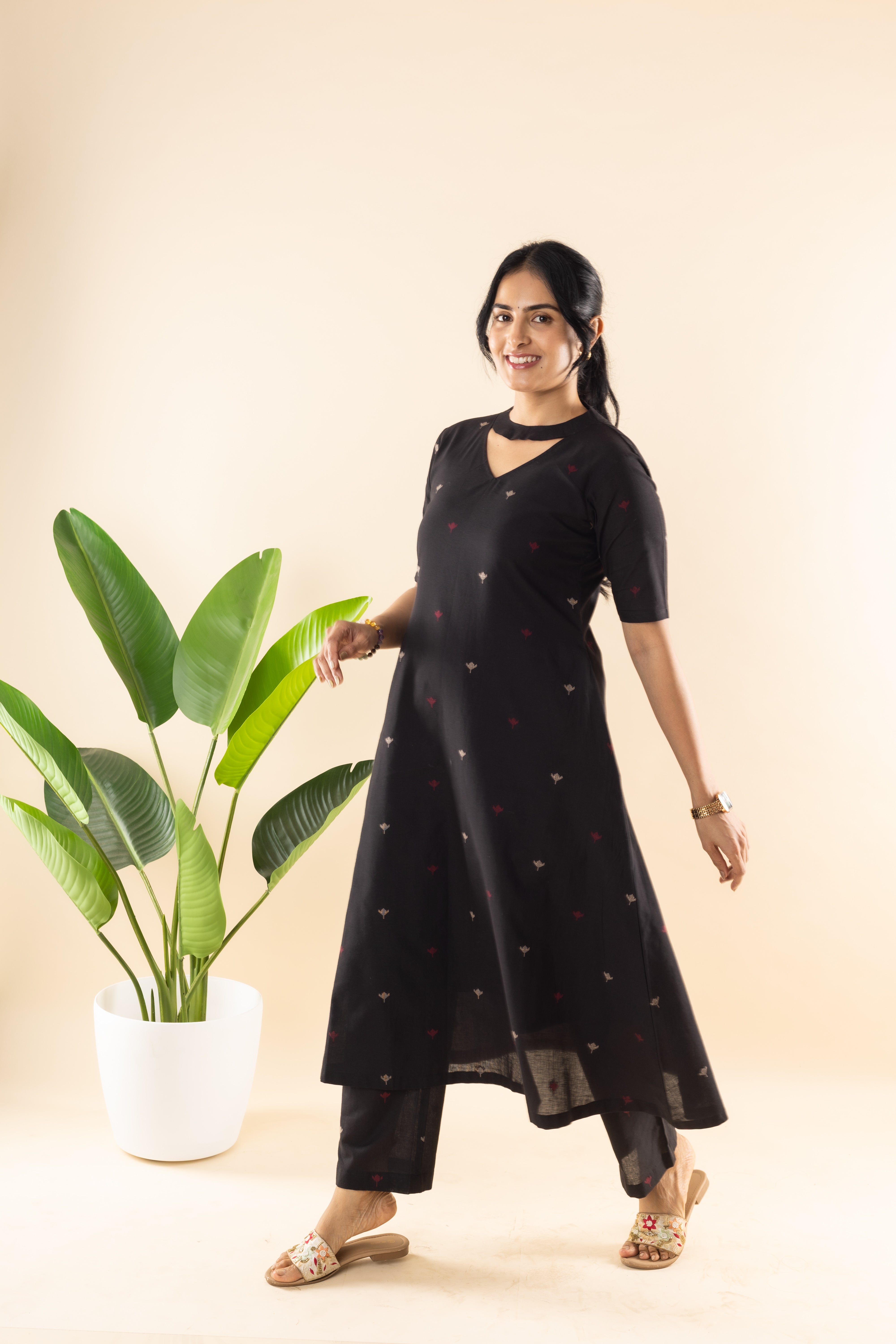 Woman wearing Black Handloom cotton kurta set for work