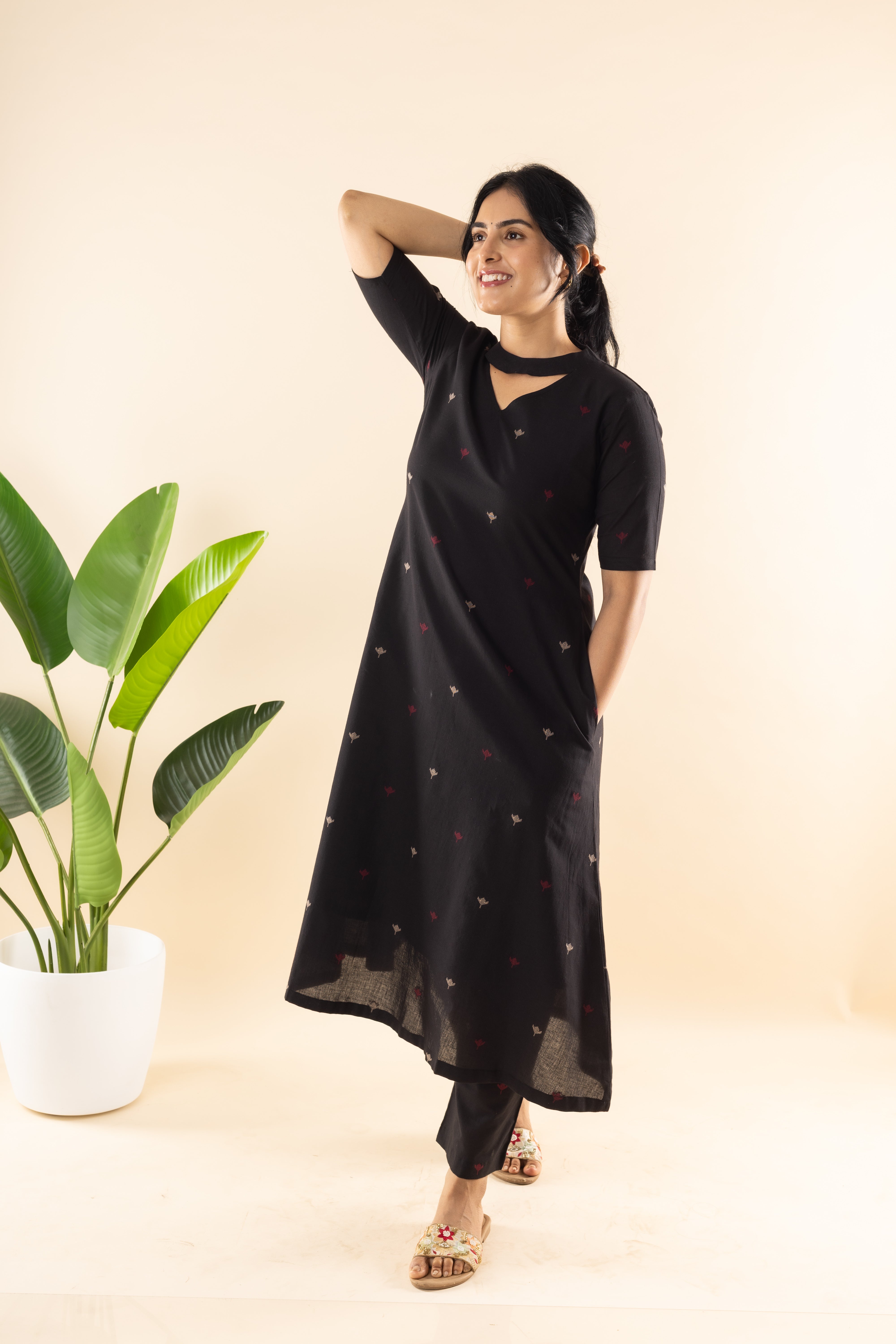 Woman wearing Black Handloom cotton kurta set for work